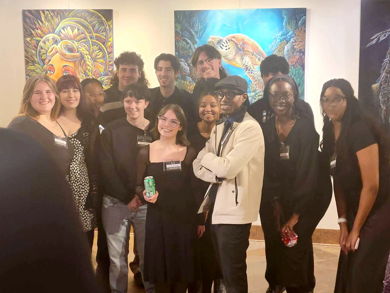 Artists and guests at the Art of Transformation show