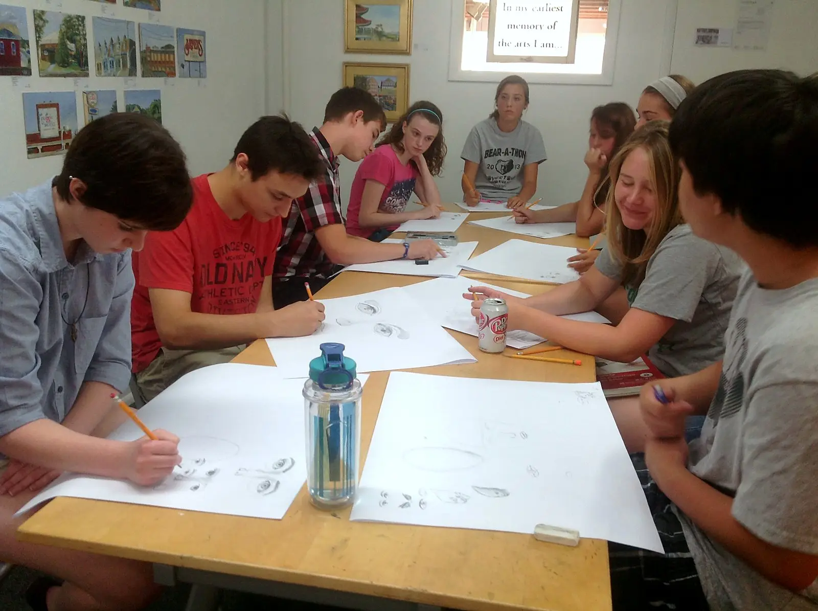Teens drawing together at open studio