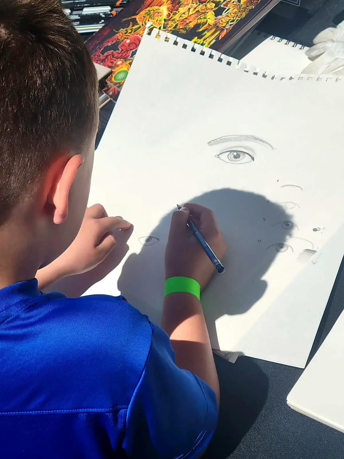 A young student drawing a portrait