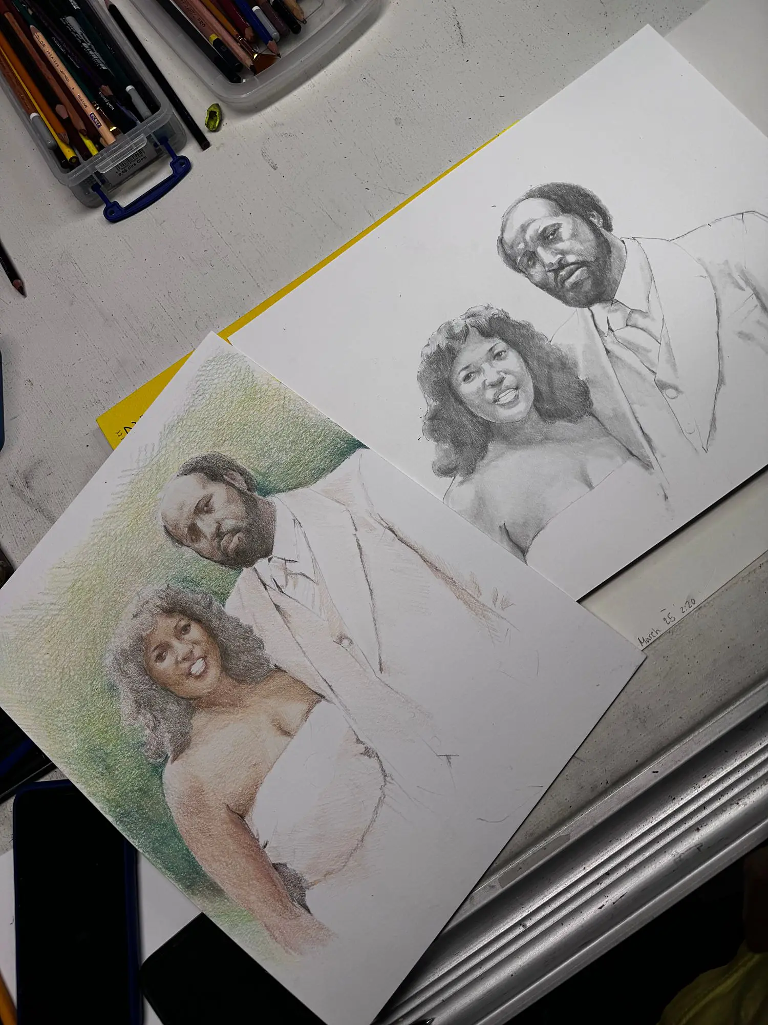 Colored pencil and graphite studies of a couple