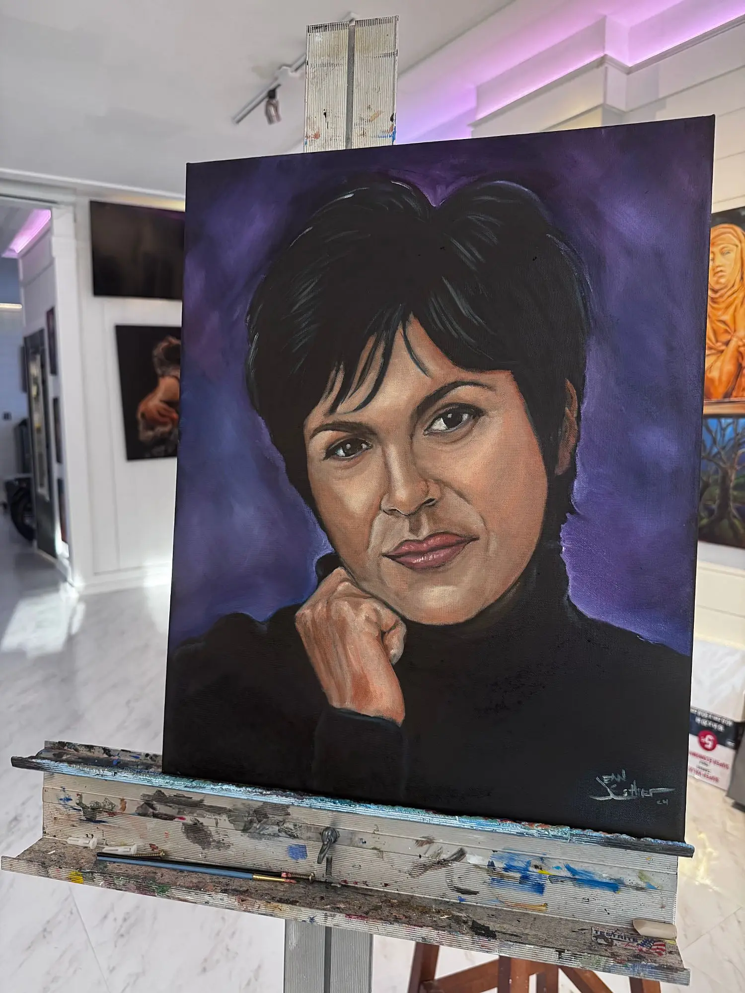 Oil portrait of a woman on a violet background