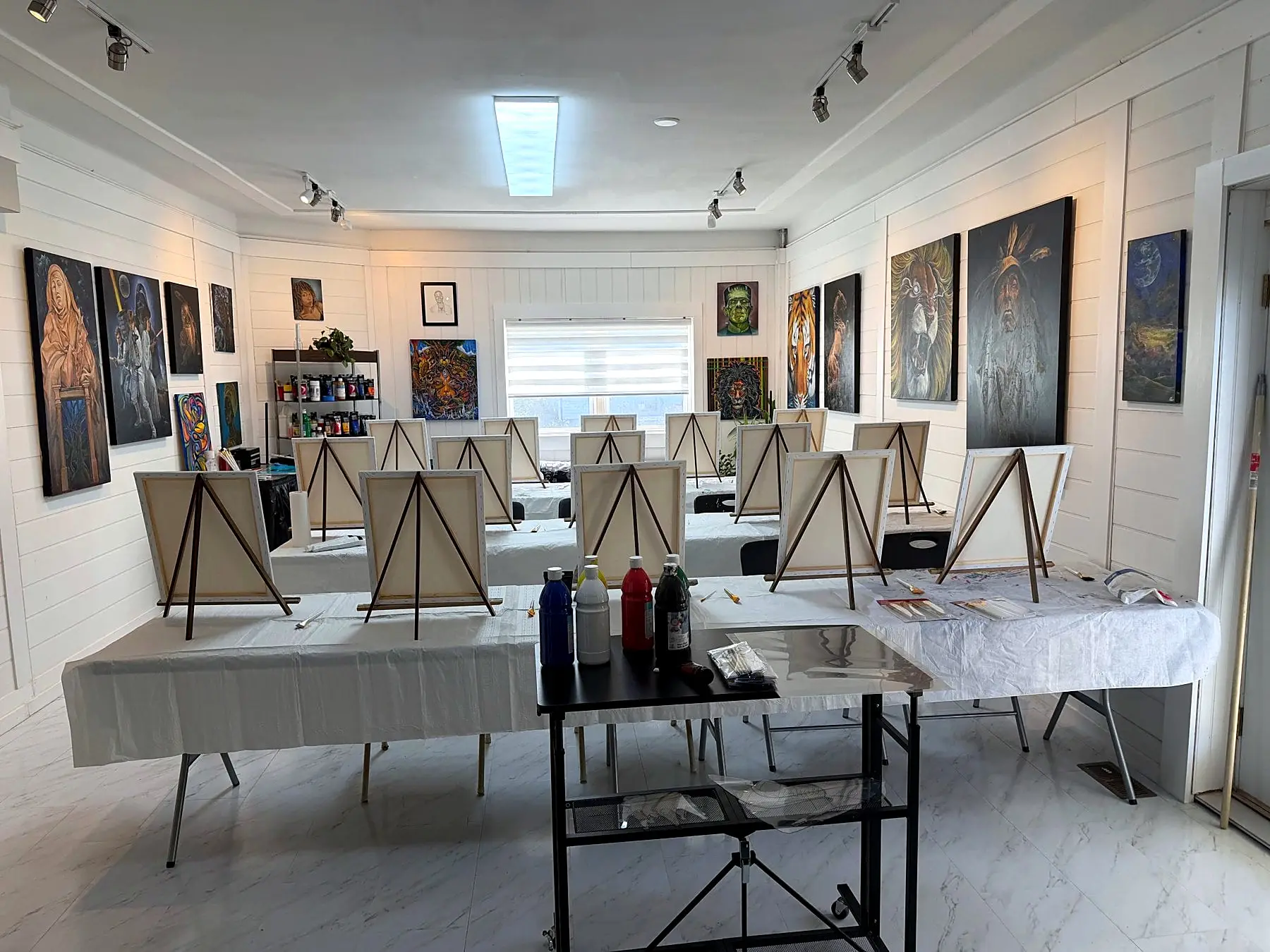 Easels and canvases ready before guests arrive