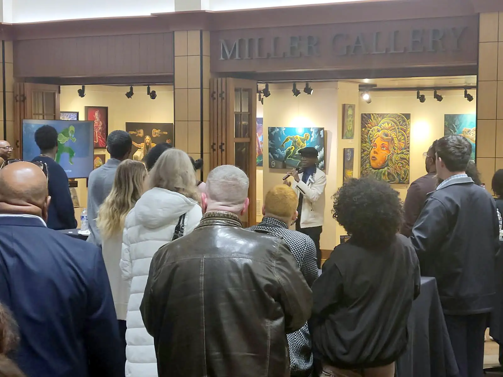 Visitors at a gallery opening